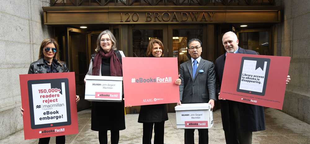 Left to right: Immediate Past President Loida Garcia Febo, Public Library Association Executive Director Barb Macikas, Past President Sari Feldman, Senior Director, Public Policy & Government Relations Alan Inouye, deliver petitions to MacMillan Publishers Headquarters in New York City.